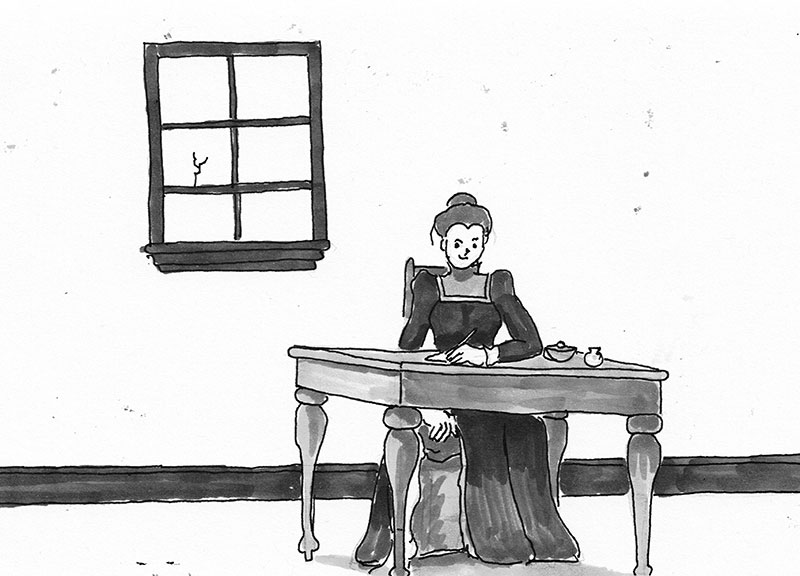 A woman sits at a desk writing a letter