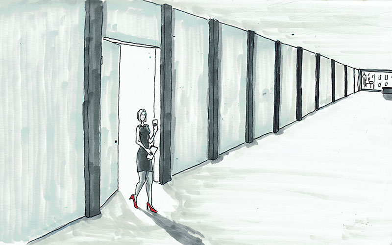 a slender woman in red heals walks through a door