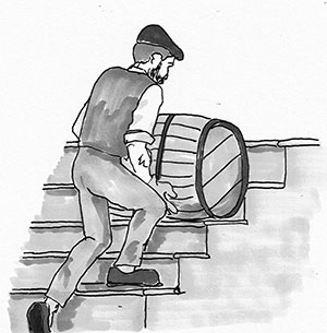 a man pushing a barrel of beer up a flight of steps