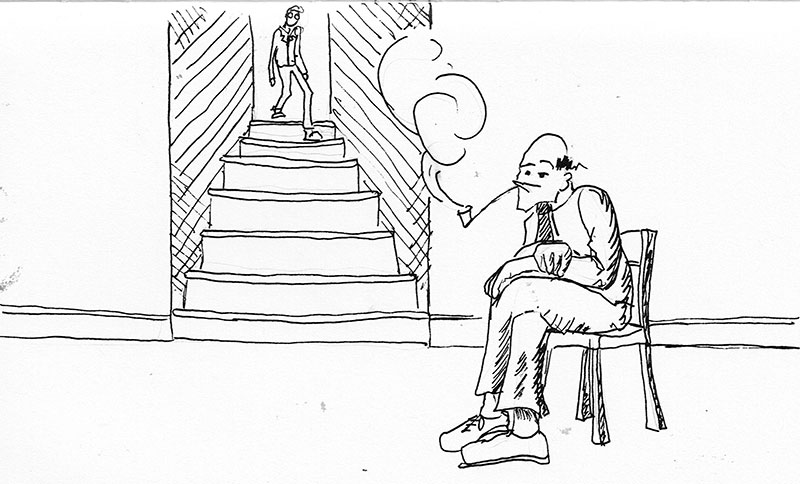 a man smoking at the bottom of a set of steps
